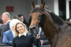 MELBOURNE, AUSTRALIA - SEPTEMBER 13: Kate Brideoake poses with Vinrock after winning Race 3, the Rubaroc Exford Plate during Melbourne Racing at Flemington Racecourse on September 13, 2025 in Melbourne, Australia. (Photo by Vince Caligiuri/Getty Images)