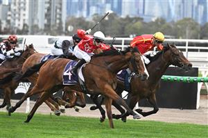 MELBOURNE, AUSTRALIA - SEPTEMBER 13: Celine Gaudray riding Cafe Millenium defeats Transaltlantic in Race 5, the Tontonan Stakes during Melbourne Racing at Flemington Racecourse on September 13, 2025 in Melbourne, Australia. (Photo by Vince Caligiuri/Getty Images)