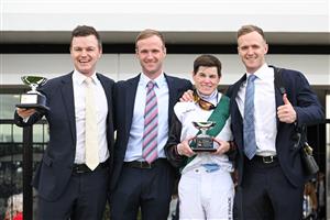 MELBOURNE, AUSTRALIA - SEPTEMBER 13: Craig Williams poses with trophy with Co trainers Ben Hayes, JD Hayes and Will Hayes (r) after riding Mr Brightside to win Race 8, the Crown Makybe Diva Stakes during Melbourne Racing at Flemington Racecourse on September 13, 2025 in Melbourne, Australia. (Photo by Vince Caligiuri/Getty Images)