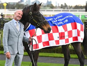 MELBOURNE, AUSTRALIA - SEPTEMBER 13: Three time Melbourne Cup winners Glen Boss and champion mare Makybe Diva pose in the mounting yard before Race 8, the Crown Makybe Diva Stakes during Melbourne Racing at Flemington Racecourse on September 13, 2025 in Melbourne, Australia. (Photo by Vince Caligiuri/Getty Images)