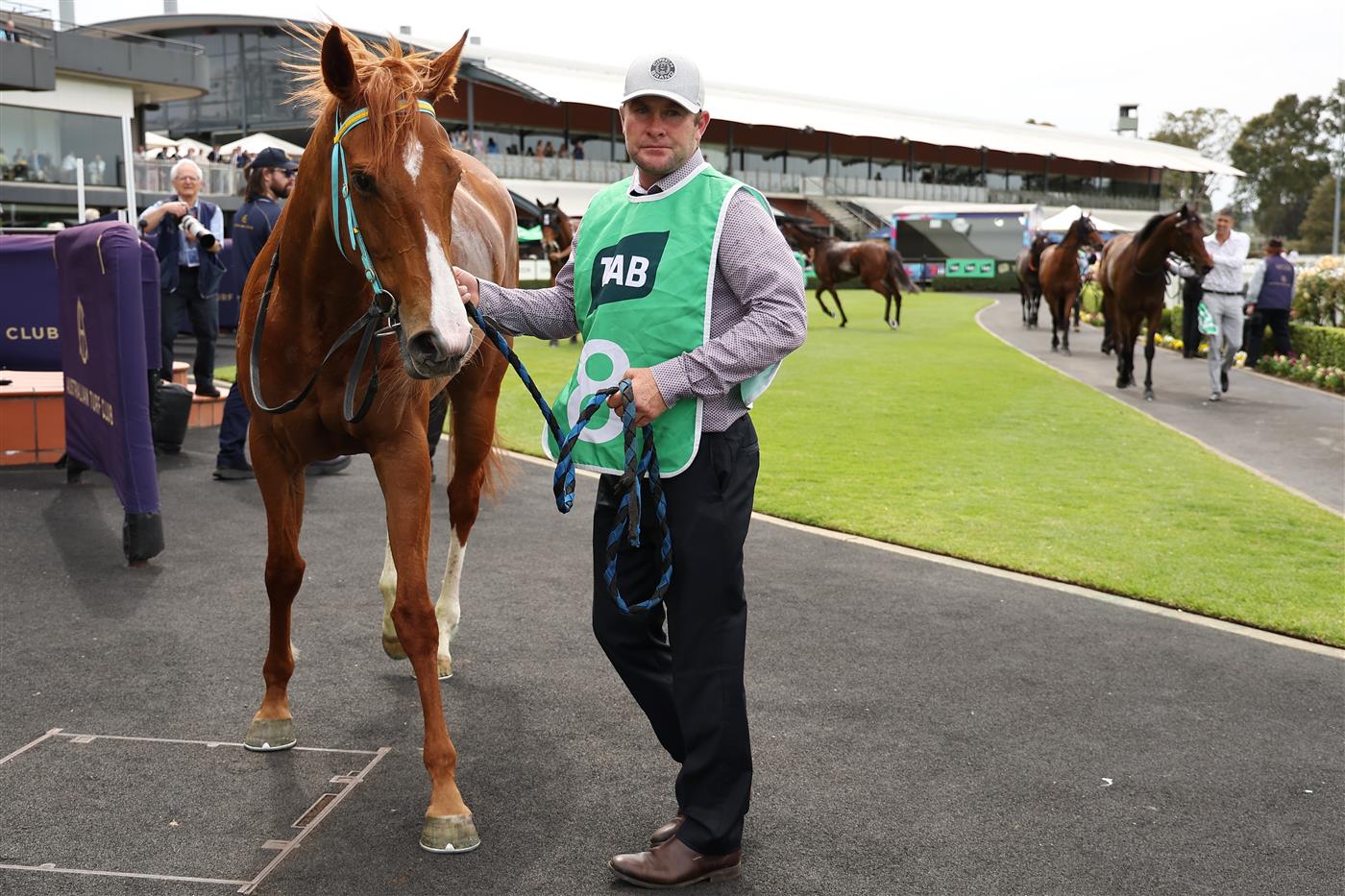 SYDNEY, AUSTRALIA - SEPTEMBER 27: Trainer Brett Robb looks on after Zac Lloyd riding  Poisen Point win Race 2 TAB Highway Handicap during Sydney Racing at Rosehill Gardens on September 27, 2025 in Sydney, Australia. (Photo by Jeremy Ng/Getty Images)