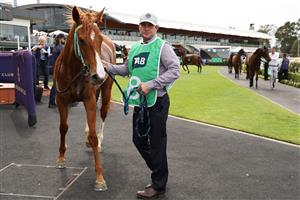 SYDNEY, AUSTRALIA - SEPTEMBER 27: Trainer Brett Robb looks on after Zac Lloyd riding  Poisen Point win Race 2 TAB Highway Handicap during Sydney Racing at Rosehill Gardens on September 27, 2025 in Sydney, Australia. (Photo by Jeremy Ng/Getty Images)