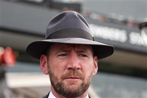 SYDNEY, AUSTRALIA - SEPTEMBER 27: Trainer Ciaron Maher looks on after Tim Clark riding Piggyback  win Race 3 Asahi Super Dry Colin Stephen Quality  during Sydney Racing at Rosehill Gardens on September 27, 2025 in Sydney, Australia. (Photo by Jeremy Ng/Getty Images)
