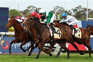 SYDNEY, AUSTRALIA - SEPTEMBER 27: Tommy Berry riding Marhoona  win Race 6 Petaluma Heritage Stakes during Sydney Racing at Rosehill Gardens on September 27, 2025 in Sydney, Australia. (Photo by Jeremy Ng/Getty Images)