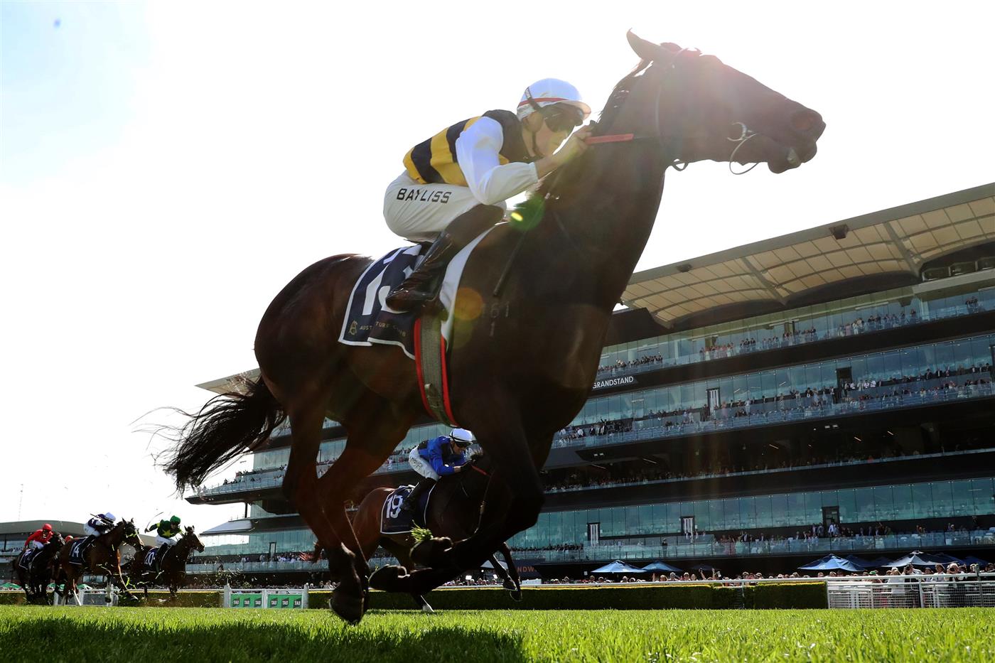 SYDNEY, AUSTRALIA - OCTOBER 04: Regan Bayliss riding Perfumist win Race 5 Melbourne Storm Mile during Sydney Racing at Royal Randwick Racecourse on October 04, 2025 in Sydney, Australia. (Photo by Jeremy Ng/Getty Images)