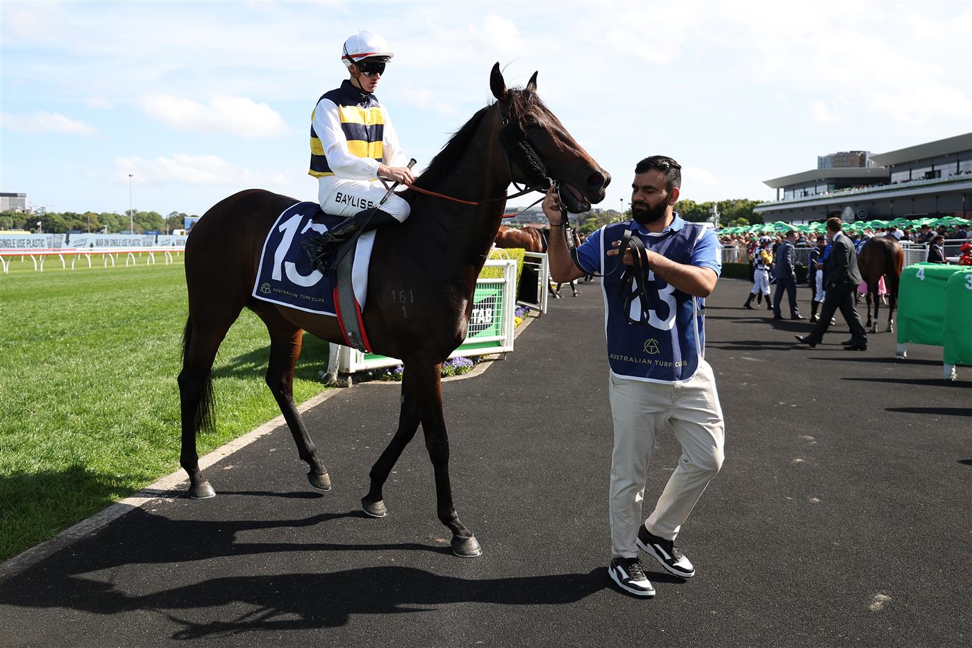 SYDNEY, AUSTRALIA - OCTOBER 04: Regan Bayliss riding Perfumist win Race 5 Melbourne Storm Mile during Sydney Racing at Royal Randwick Racecourse on October 04, 2025 in Sydney, Australia. (Photo by Jeremy Ng/Getty Images)