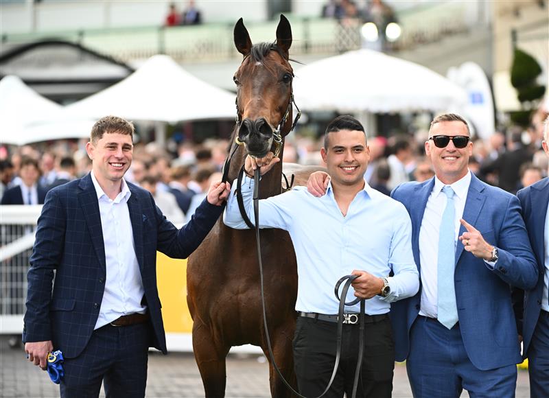 MELBOURNE, AUSTRALIA - OCTOBER 11: Trainer Tony Gollan (r) poses after Transatlantic won Race 7, the Hyland Race Colours Toorak Handicap during Melbourne Racing at Caulfield Racecourse on October 11, 2025 in Melbourne, Australia. (Photo by Vince Caligiuri/Getty Images)