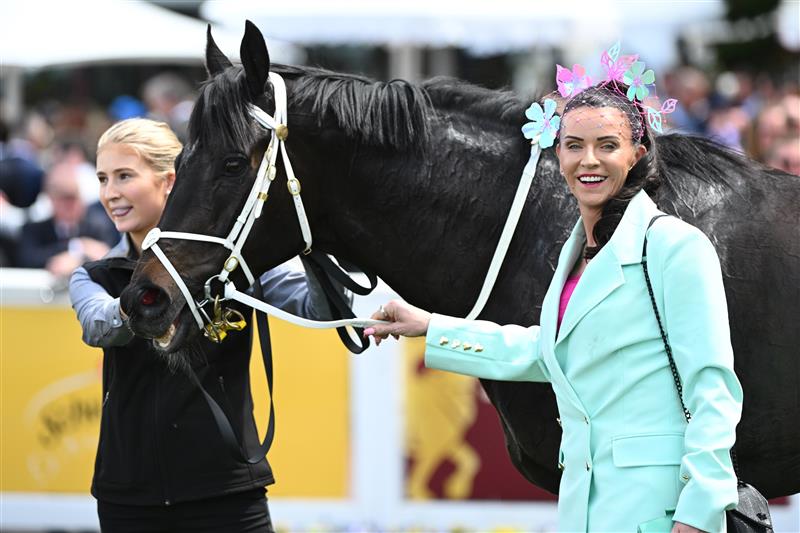 MELBOURNE, AUSTRALIA - OCTOBER 11: Trainer Natalie Young poses with Brayden Star after winning Race 3, the Sportsbet Herbert Power Stakes during Melbourne Racing at Caulfield Racecourse on October 11, 2025 in Melbourne, Australia. (Photo by Vince Caligiuri/Getty Images)