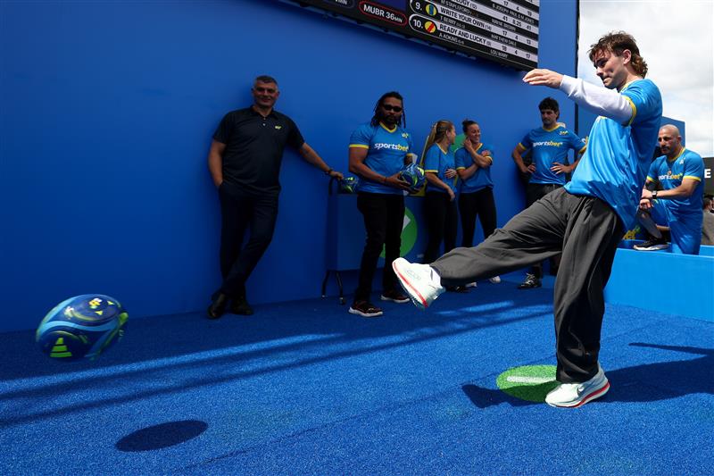 MELBOURNE, AUSTRALIA - OCTOBER 11: Nick Watson of the Hawks kicks for cash during the Sportsbet Kick for Cash event at Caulfield Racecourse, celebrating the 20th anniversary of celebrating the 20th anniversary of John Aloisi kicking the winning penalty that qualified Australia for the 2006 World Cup. (Getty)
