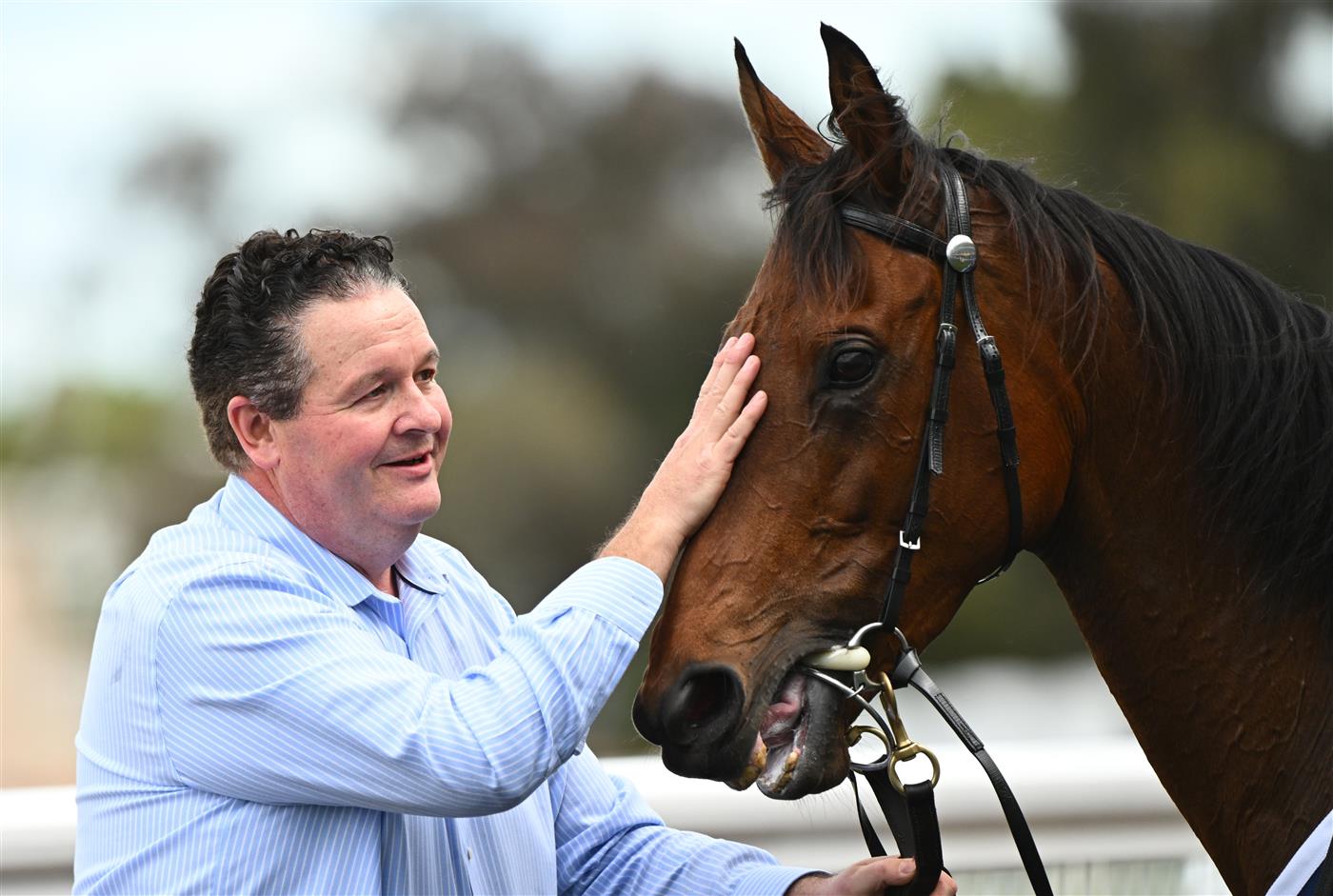 MELBOURNE, AUSTRALIA - OCTOBER 11: Trainer Kevin Daffy poses with Oh Too Good after winning Race 4, the Catanach's Jewellers Vase. (Getty)