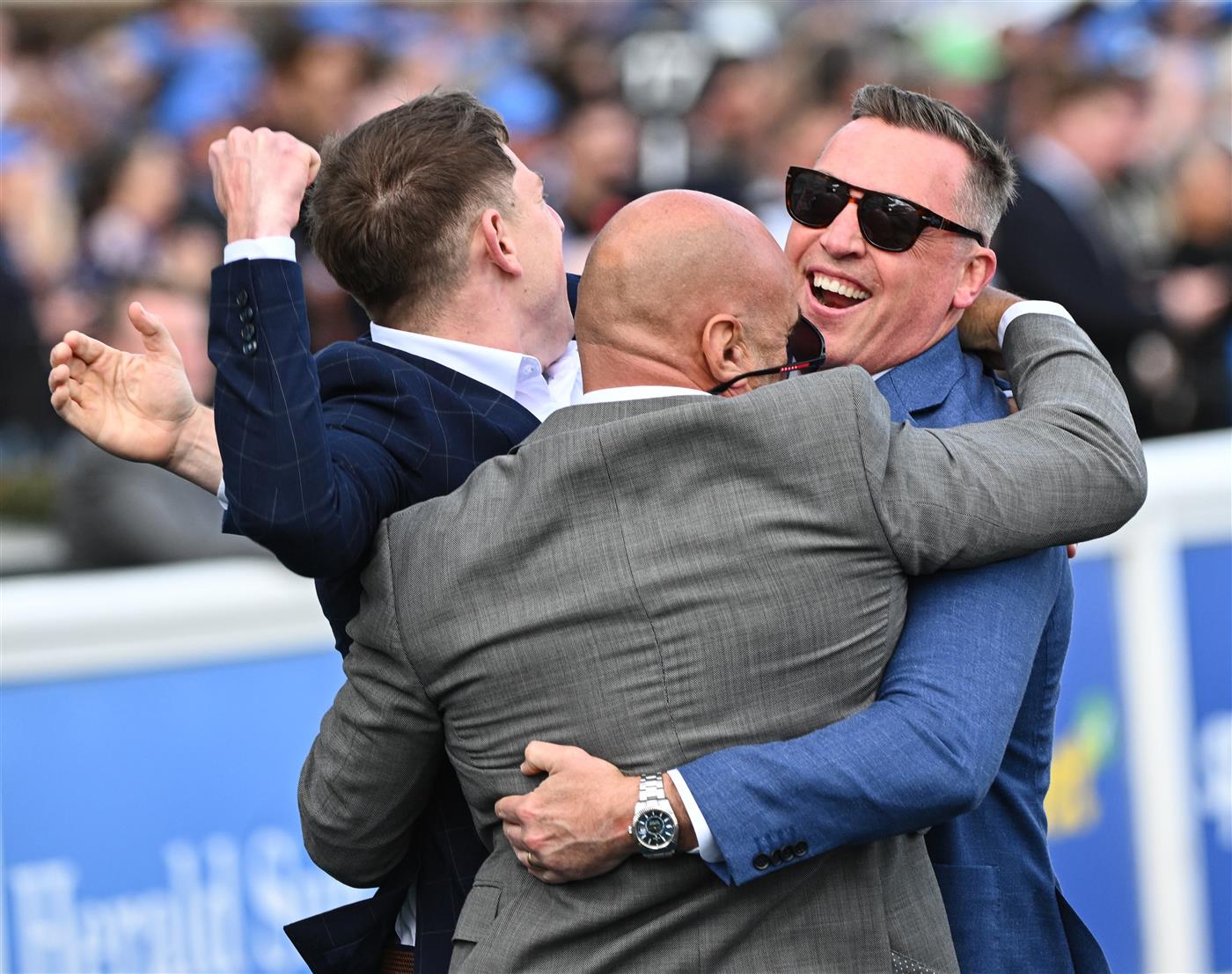MELBOURNE, AUSTRALIA - OCTOBER 11: Trainer Tony Gollan (r) reacts after Transatlantic won Race 7, the Hyland Race Colours Toorak Handicap during Melbourne Racing at Caulfield Racecourse on October 11, 2025 in Melbourne, Australia. (Photo by Vince Caligiuri/Getty Images)