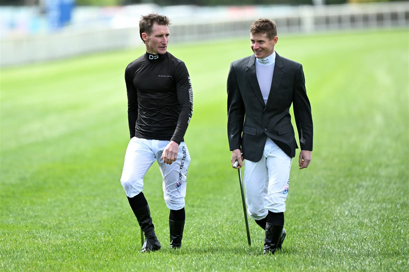 MELBOURNE, AUSTRALIA - OCTOBER 11: Daniel Stackhouse and James McDonald walk the track during Melbourne Racing at Caulfield Racecourse on October 11, 2025 in Melbourne, Australia. (Photo by Vince Caligiuri/Getty Images)