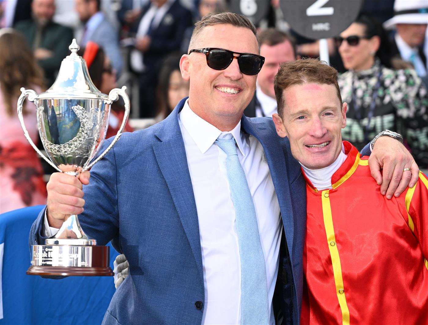 MELBOURNE, AUSTRALIA - OCTOBER 11: Trainer Tony Gollan poses with Mark Zahra after Transatlantic won Race 7, the Hyland Race Colours Toorak Handicap during Melbourne Racing at Caulfield Racecourse on October 11, 2025 in Melbourne, Australia. (Photo by Vince Caligiuri/Getty Images)