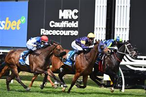 MELBOURNE, AUSTRALIA - OCTOBER 11: Craig Williams riding Brayden Star defeats Plymouth (ctr) and Whisky on the hill in Race 3, the Sportsbet Herbert Power Stakes during Melbourne Racing at Caulfield Racecourse on October 11, 2025 in Melbourne, Australia. (Photo by Vince Caligiuri/Getty Images)