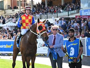 MELBOURNE, AUSTRALIA - OCTOBER 11: Damian Lane riding Autumn Boy after winning Race 8, the Sportsbet Caulfield Guineas during Melbourne Racing at Caulfield Racecourse on October 11, 2025 in Melbourne, Australia. (Photo by Vince Caligiuri/Getty Images)