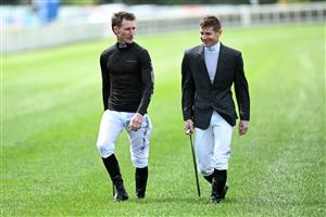 MELBOURNE, AUSTRALIA - OCTOBER 11: Daniel Stackhouse and James McDonald walk the track during Melbourne Racing at Caulfield Racecourse on October 11, 2025 in Melbourne, Australia. (Photo by Vince Caligiuri/Getty Images)