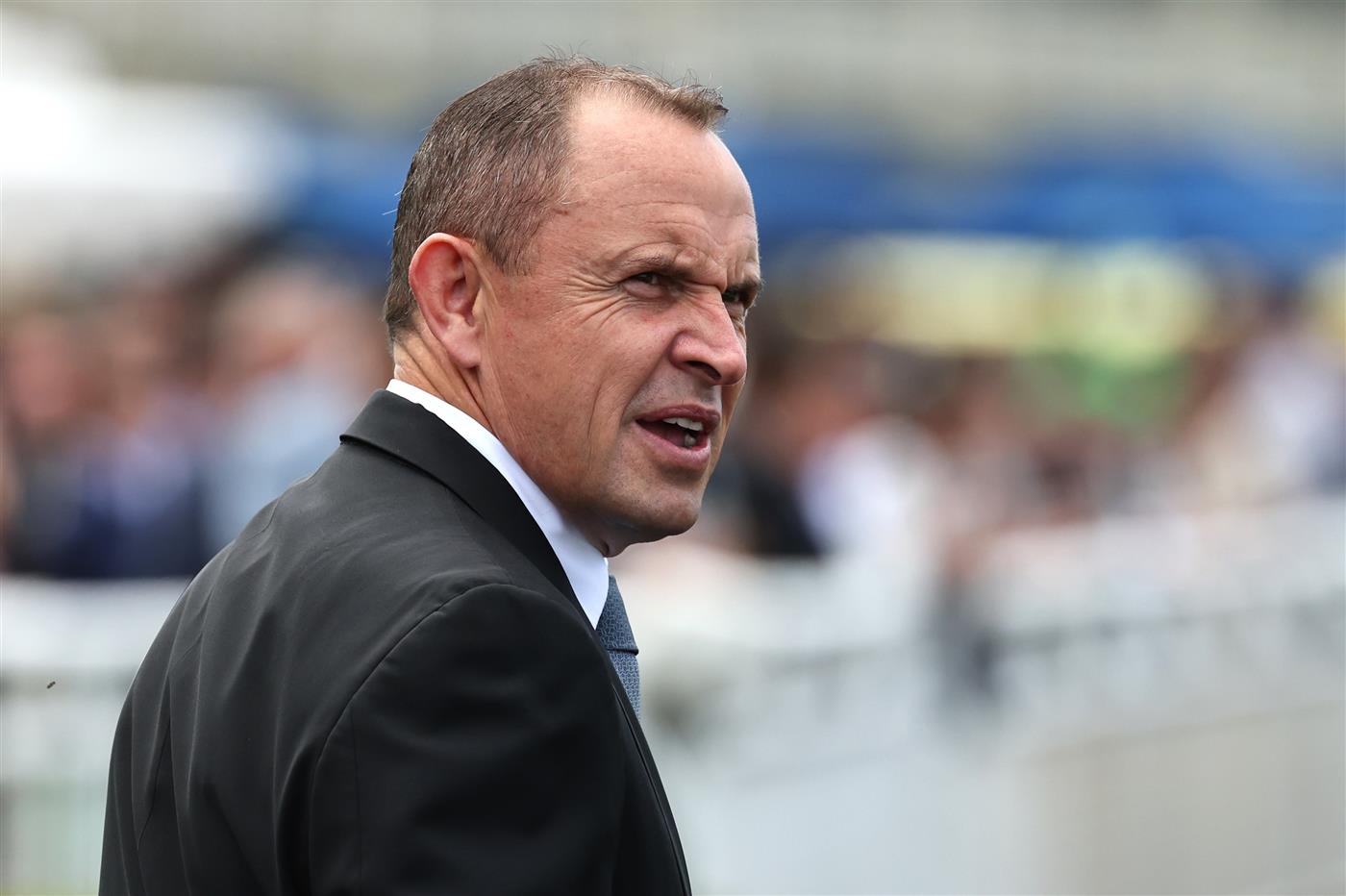 SYDNEY, AUSTRALIA - OCTOBER 18: Trainer Chris Waller looks on after Tommy Berry riding Panova win Race 1 Bisley Workwear Reginald Allen Quality during Sydney Racing at Royal Randwick Racecourse on October 18, 2025 in Sydney, Australia. (Photo by Jeremy Ng/Getty Images)