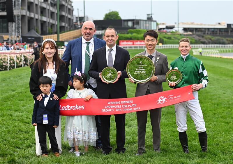 MELBOURNE, AUSTRALIA - OCTOBER 25: James McDonald poses with trainer Chris Waller, Sam Fairgray and owner Jun Zhang representing Yulong after Via Sistina won Race 10 , the Ladbrokes Cox Plate during Cox Plate Day at Moonee Valley Racecourse on October 25, 2025 in Melbourne, Australia. (Photo by Vince Caligiuri/Getty Images)