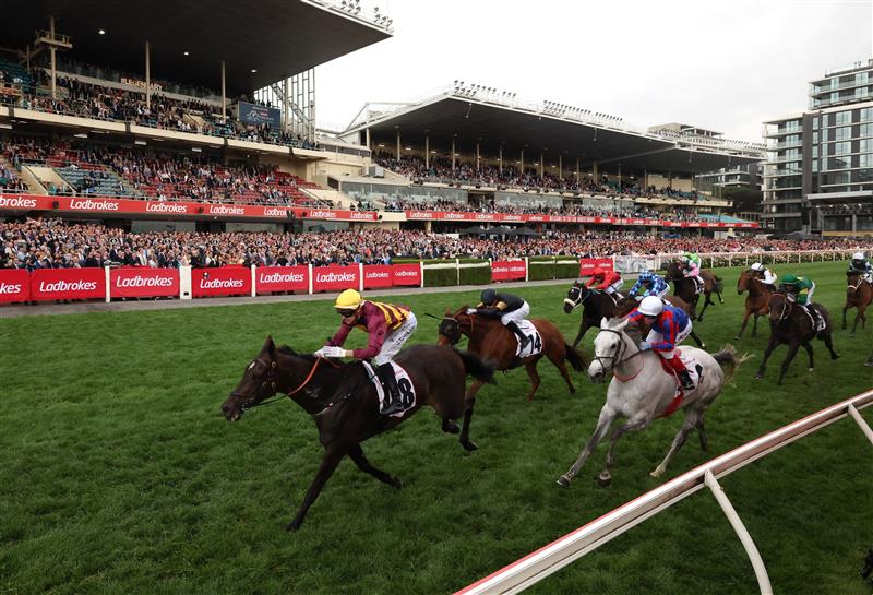MELBOURNE, AUSTRALIA - OCTOBER 25: Jordan Childs rides #8 She's A Hustler to win the Tesio Stakes. (Getty)