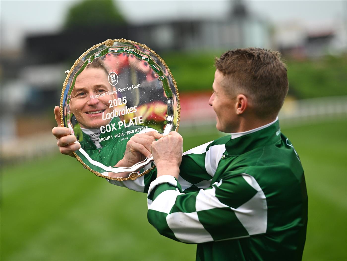 MELBOURNE, AUSTRALIA - OCTOBER 25: James McDonald poses with the Cox Plate after riding Via Sistina to win Race 10 , the Ladbrokes Cox Plate during Cox Plate Day at Moonee Valley Racecourse on October 25, 2025 in Melbourne, Australia. (Photo by Vince Caligiuri/Getty Images)