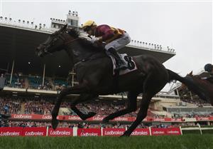 MELBOURNE, AUSTRALIA - OCTOBER 25: Jordan Childs rides #8 She's A Hustler to win the Tesio Stakes. (Getty)