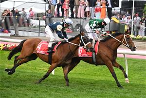 MELBOURNE, AUSTRALIA - OCTOBER 25: James McDonald riding Via Sistina defeats Mark Zahra riding Buckaroo and Damian Lane riding Treasurethe Moment in Race 10 , the Ladbrokes Cox Plate during Cox Plate Day at Moonee Valley Racecourse on October 25, 2025 in Melbourne, Australia. (Photo by Vince Caligiuri/Getty Images)
