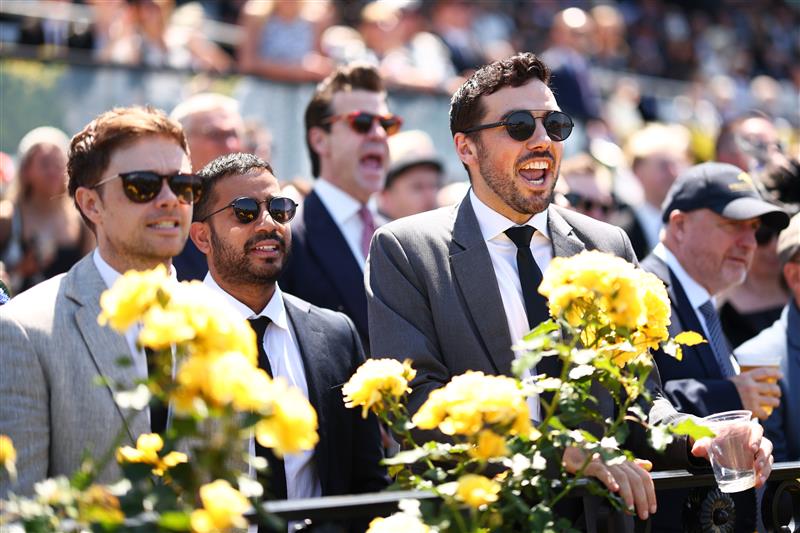 MELBOURNE, AUSTRALIA - NOVEMBER 01: Racegoers celebrate during Melbourne Racing at Flemington Racecourse on November 01, 2025 in Melbourne, Australia. (Photo by Daniel Pockett/Getty Images)