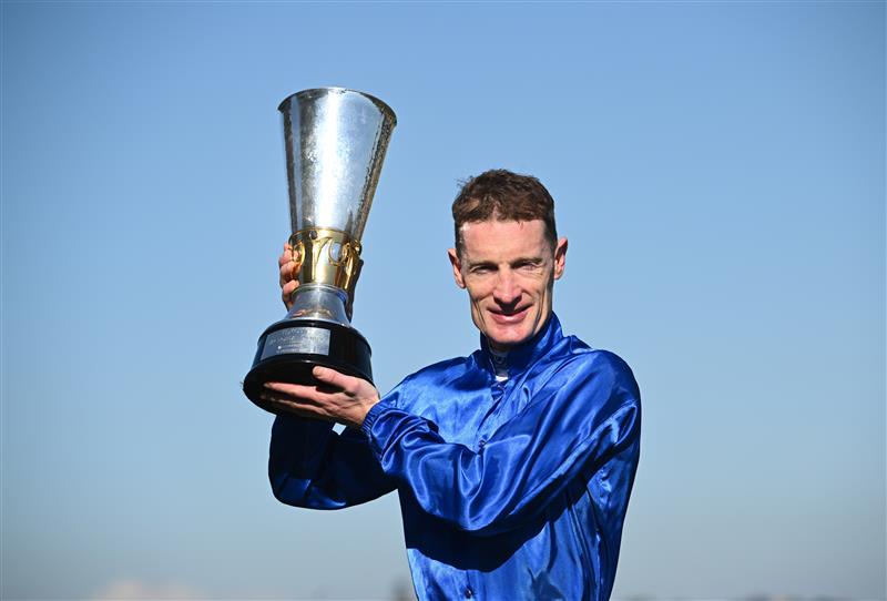 MELBOURNE, AUSTRALIA - NOVEMBER 01: Mark Zahra poses with trophy after riding Observer to win Race 7, the Howden Victoria Derby during 2025 Derby Day at Flemington Racecourse on November 01, 2025 in Melbourne, Australia. (Photo by Vince Caligiuri/Getty Images)