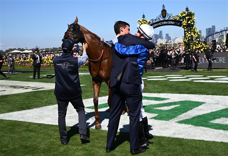 MELBOURNE, AUSTRALIA - NOVEMBER 01: Mark Zahra riding Tentyris is congratulated by Trainer Sam Freedman after winning Race 6, the Coolmore Stud Stakes during 2025 Derby Day at Flemington Racecourse on November 01, 2025 in Melbourne, Australia. (Photo by Vince Caligiuri/Getty Images)