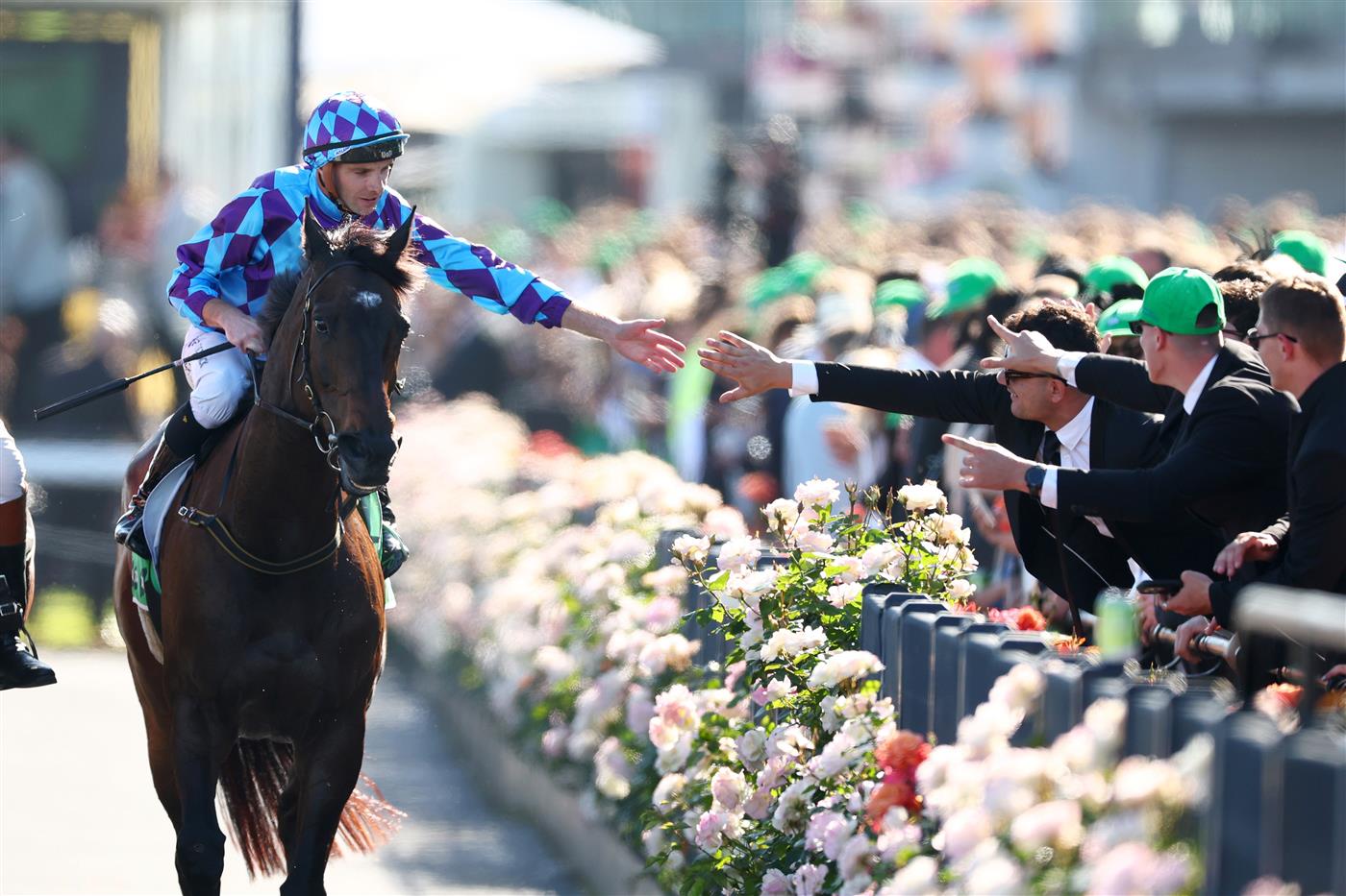 MELBOURNE, AUSTRALIA - NOVEMBER 01: Declan Bates celebrates after riding Pride of Jenni to win race eight the Tab Empire Rose Stakes during Melbourne Racing at Flemington Racecourse on November 01, 2025 in Melbourne, Australia. (Photo by Daniel Pockett/Getty Images)