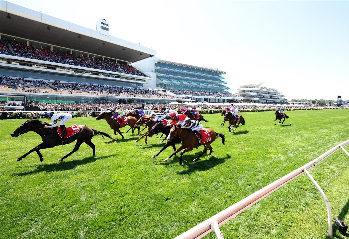 MELBOURNE, AUSTRALIA - NOVEMBER 01: Tommy Berry rides #5 Caballus to win race three the G.h. Mumm Rising Fast Stakes during Melbourne Racing at Flemington Racecourse on November 01, 2025 in Melbourne, Australia. (Photo by Robert Cianflone/Getty Images)