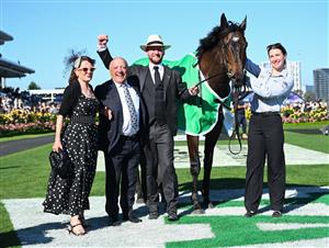 MELBOURNE, AUSTRALIA - NOVEMBER 01: Trainer Ciaron Maher poses with owner Tony Ottobre after Pride of Jenni won Race 8, the Tab Empire Rose Stakes during 2025 Derby Day at Flemington Racecourse on November 01, 2025 in Melbourne, Australia. (Photo by Vince Caligiuri/Getty Images)