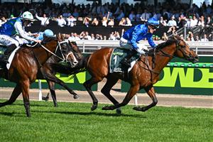 MELBOURNE, AUSTRALIA - NOVEMBER 01: Mark Zahra riding  Observer winning Race 7, the Howden Victoria Derby during 2025 Derby Day at Flemington Racecourse on November 01, 2025 in Melbourne, Australia. (Photo by Vince Caligiuri/Getty Images)