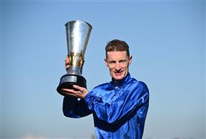 MELBOURNE, AUSTRALIA - NOVEMBER 01: Mark Zahra poses with trophy after riding Observer to win Race 7, the Howden Victoria Derby during 2025 Derby Day at Flemington Racecourse on November 01, 2025 in Melbourne, Australia. (Photo by Vince Caligiuri/Getty Images)