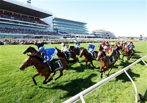 MELBOURNE, AUSTRALIA - NOVEMBER 01: Mark Zahra rides #1 Observer past the post on the way to winning race seven the Howden Victoria Derby during Melbourne Racing at Flemington Racecourse on November 01, 2025 in Melbourne, Australia. (Photo by Robert Cianflone/Getty Images)