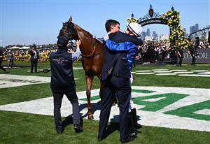 MELBOURNE, AUSTRALIA - NOVEMBER 01: Mark Zahra riding Tentyris is congratulated by Trainer Sam Freedman after winning Race 6, the Coolmore Stud Stakes during 2025 Derby Day at Flemington Racecourse on November 01, 2025 in Melbourne, Australia. (Photo by Vince Caligiuri/Getty Images)