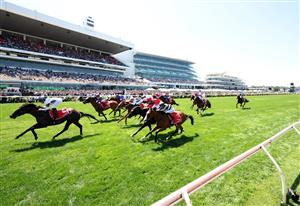 MELBOURNE, AUSTRALIA - NOVEMBER 01: Tommy Berry rides #5 Caballus to win race three the G.h. Mumm Rising Fast Stakes during Melbourne Racing at Flemington Racecourse on November 01, 2025 in Melbourne, Australia. (Photo by Robert Cianflone/Getty Images)