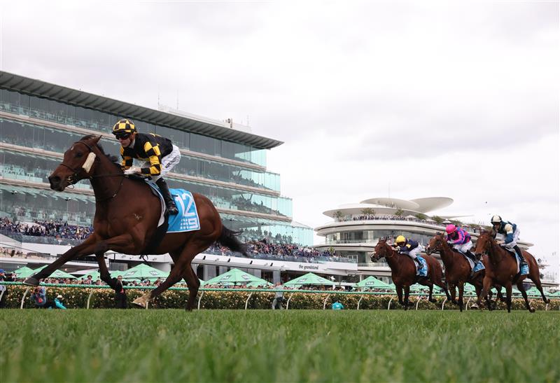 MELBOURNE, AUSTRALIA - NOVEMBER 04: Harry Coffey Rides Persian Spirit  to win race ten the Channel 9 Trophy during Melbourne Cup Day at Flemington Racecourse on November 04, 2025 in Melbourne, Australia. (Photo by Robert Cianflone/Getty Images)