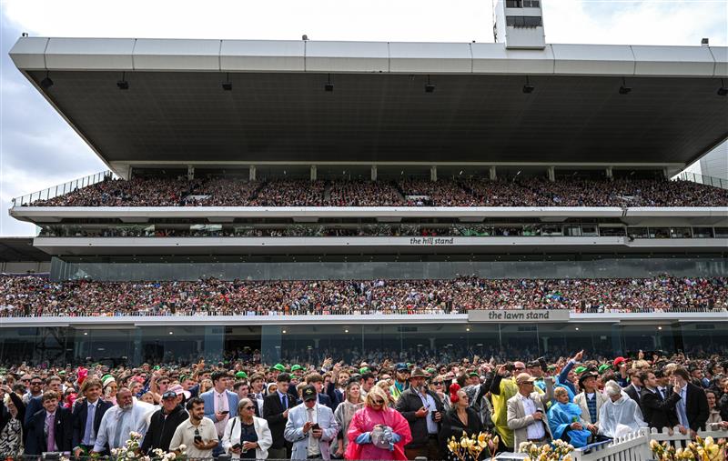MELBOURNE, AUSTRALIA - NOVEMBER 04: Huge crowd is seen in The Hill Stand before Race 7, the Lexus Melbourne Cup during Melbourne Cup Day at Flemington Racecourse on November 04, 2025 in Melbourne, Australia. (Photo by Vince Caligiuri/Getty Images)