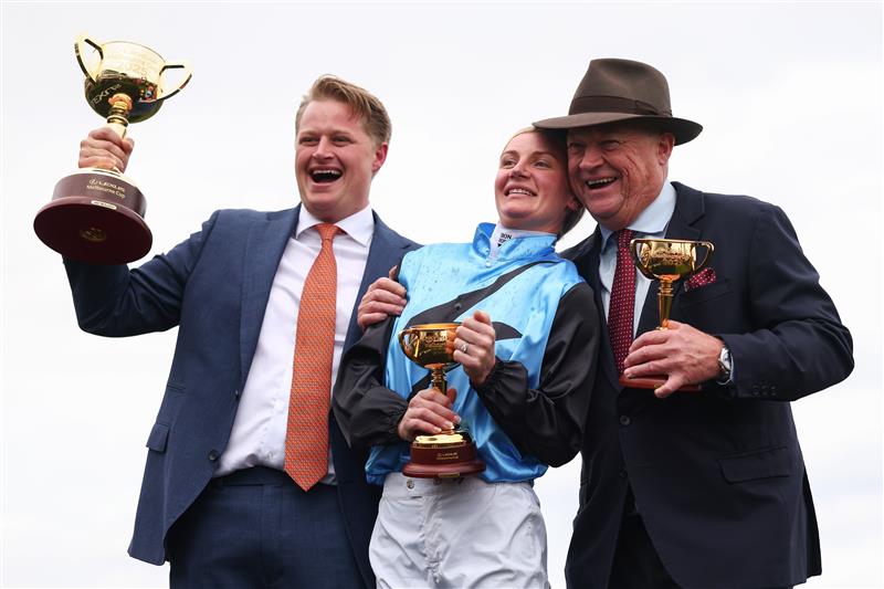 MELBOURNE, AUSTRALIA - NOVEMBER 04: Jamie Melham (C) celebrates with co trainers Tony McEvoy (R) and Calvin McEvoy after riding Half Yours during Melbourne Cup Day at Flemington Racecourse on November 04, 2025 in Melbourne, Australia. (Photo by Daniel Pockett/Getty Images)