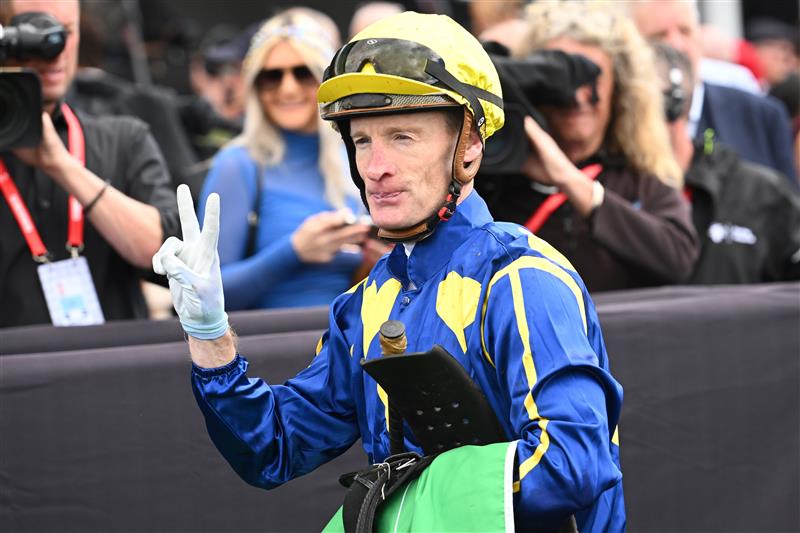 MELBOURNE, AUSTRALIA - NOVEMBER 04: Mark Zahra riding Different Gravy after winning Race 3, the Tab Trophy during Melbourne Cup Day at Flemington Racecourse on November 04, 2025 in Melbourne, Australia. (Photo by Vince Caligiuri/Getty Images)