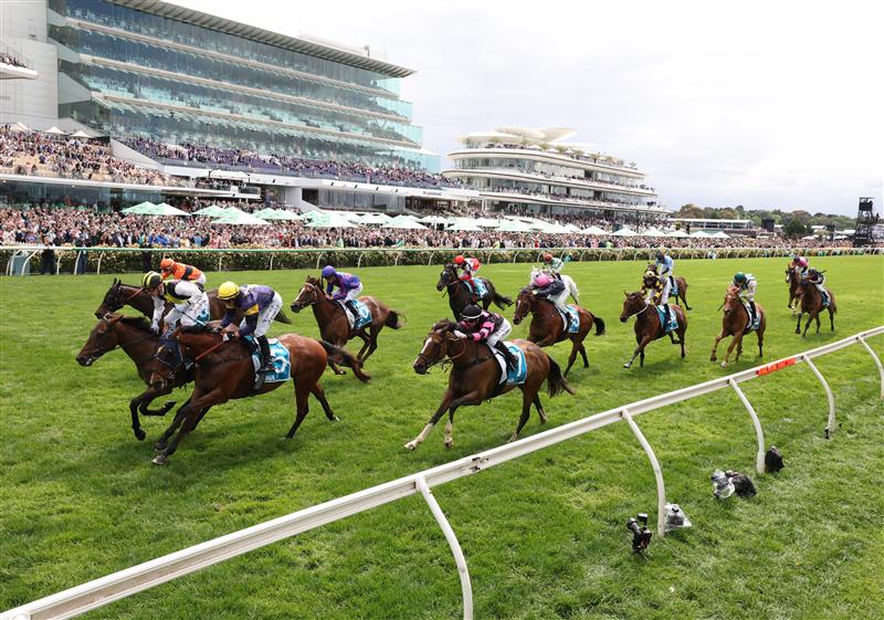 MELBOURNE, AUSTRALIA - NOVEMBER 04: Mark Zahra rides #10 Party Crasher to win race two the Ma Services Grand Handicap during Melbourne Cup Day at Flemington Racecourse on November 04, 2025 in Melbourne, Australia. (Photo by Robert Cianflone/Getty Images)