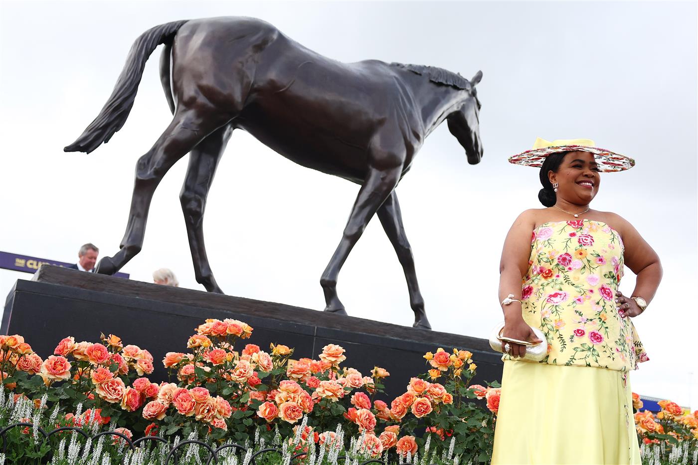 MELBOURNE, AUSTRALIA - NOVEMBER 04: A racegoer poses for a photo during Melbourne Cup Day at Flemington Racecourse on November 04, 2025 in Melbourne, Australia. (Photo by Morgan Hancock/Getty Images)