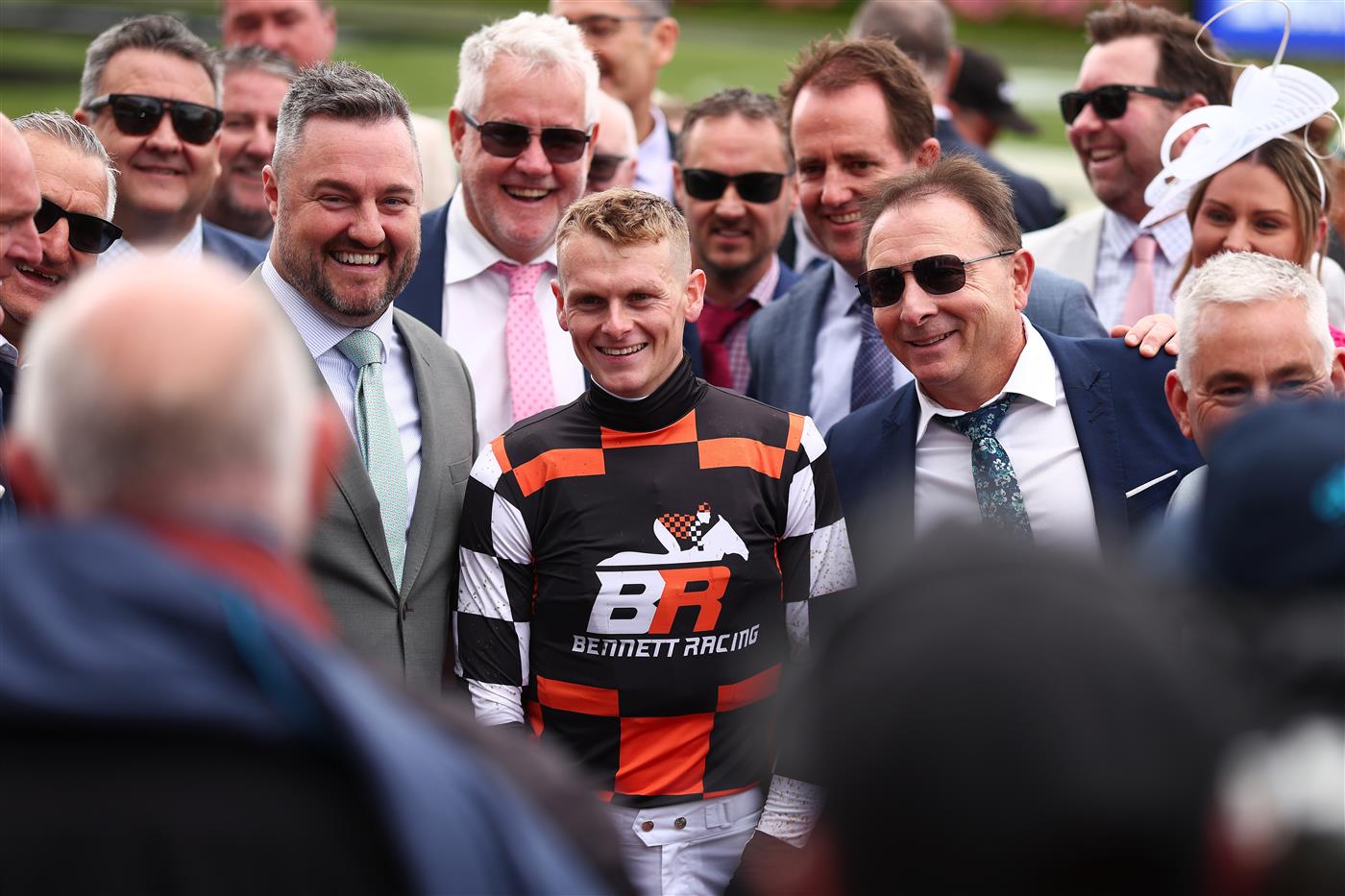 MELBOURNE, AUSTRALIA - NOVEMBER 04: Ethan Brown poses with connections after riding Tornado Valley to win Race 1, the Darley Maribyrnong Plate during Melbourne Cup Day at Flemington Racecourse on November 04, 2025 in Melbourne, Australia. (Photo by Daniel Pockett/Getty Images)