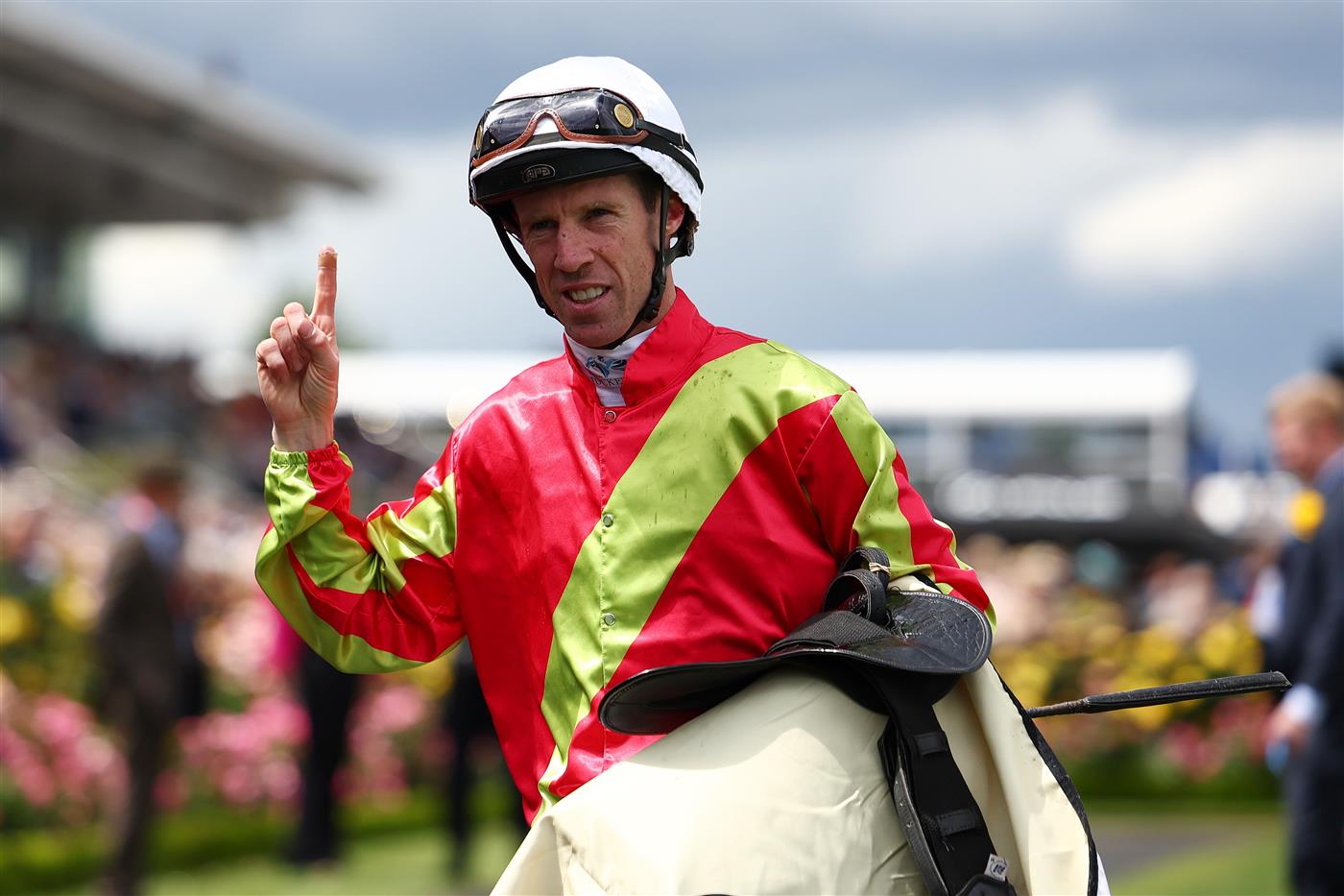 MELBOURNE, AUSTRALIA - NOVEMBER 04: John Allen celebrates after riding Kingswood to win race six the Kirin Ichiban Plate during Melbourne Cup Day at Flemington Racecourse on November 04, 2025 in Melbourne, Australia. (Photo by Morgan Hancock/Getty Images)