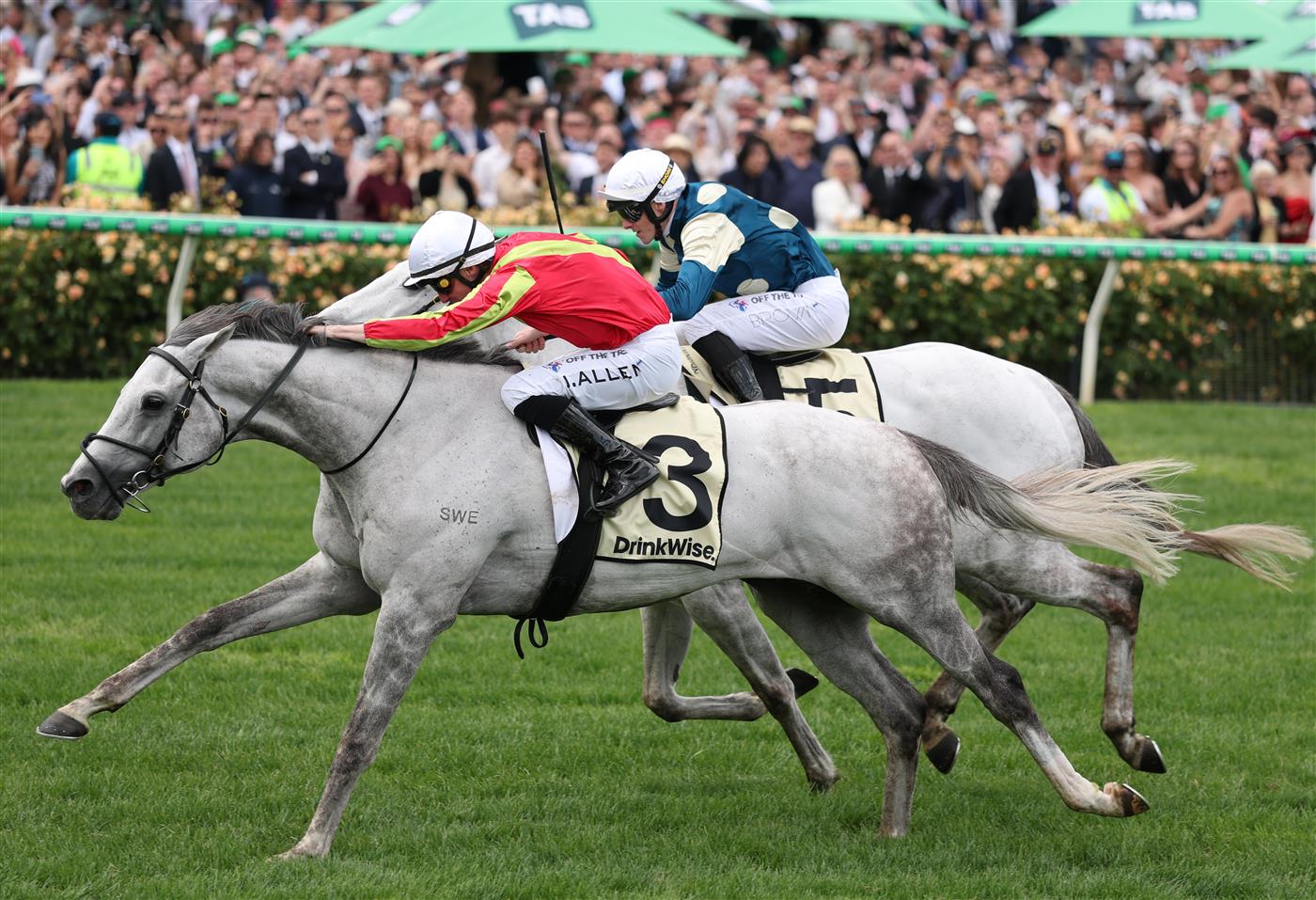 MELBOURNE, AUSTRALIA - NOVEMBER 04: John Allen rides #3 Kingswood to win race six the Kirin Ichiban Plate during Melbourne Cup Day at Flemington Racecourse on November 04, 2025 in Melbourne, Australia. (Photo by Robert Cianflone/Getty Images)