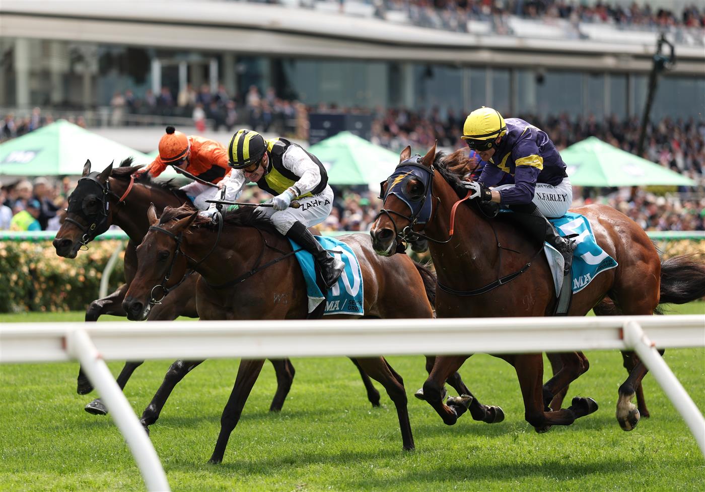 MELBOURNE, AUSTRALIA - NOVEMBER 04: Mark Zahra rides #10 Party Crasher to win race two the Ma Services Grand Handicap during Melbourne Cup Day at Flemington Racecourse on November 04, 2025 in Melbourne, Australia. (Photo by Robert Cianflone/Getty Images)
