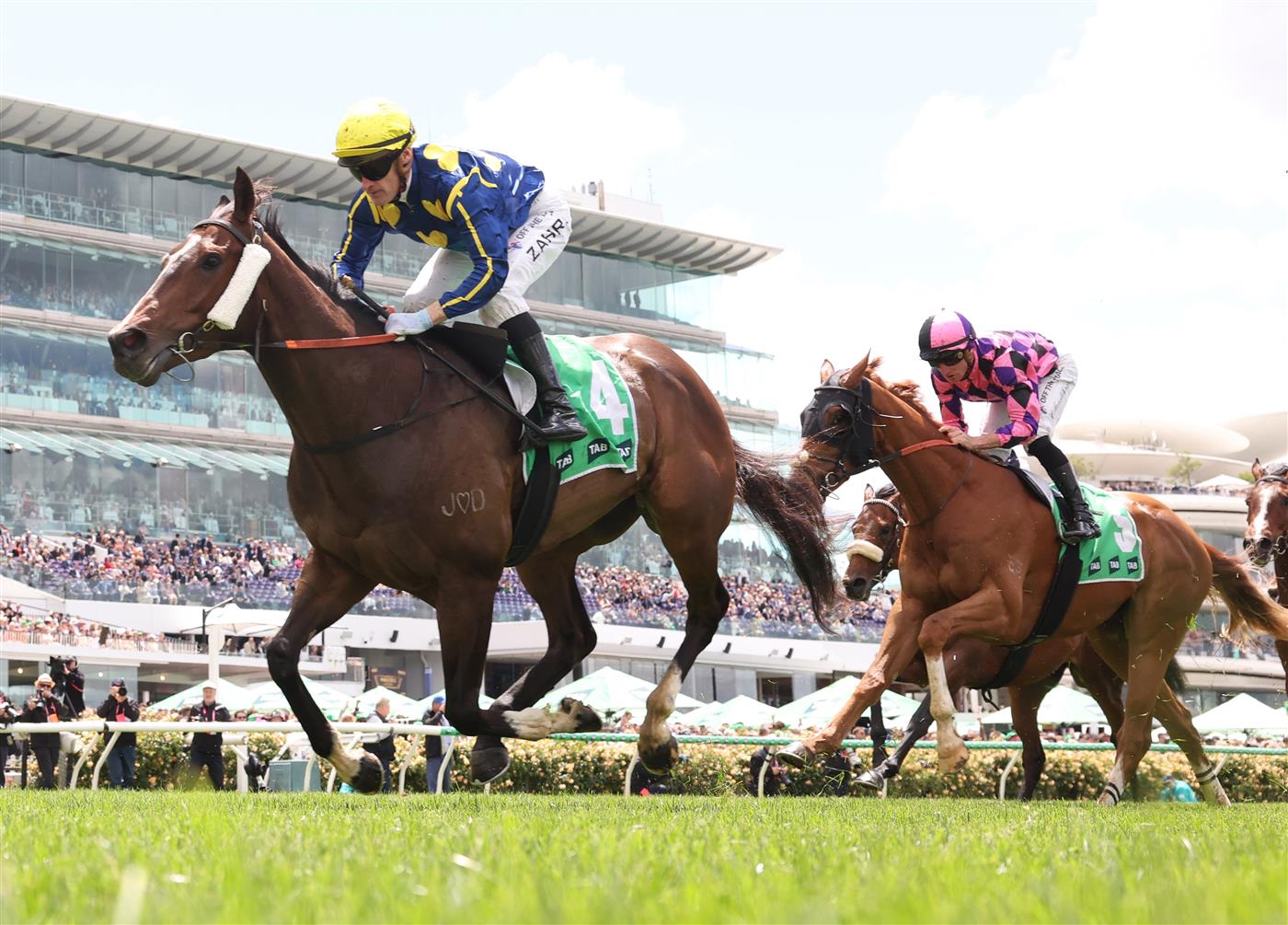 MELBOURNE, AUSTRALIA - NOVEMBER 04: Mark Zahra rides #4 Different Gravy to win race three the Tab Trophyduring Melbourne Cup Day at Flemington Racecourse on November 04, 2025 in Melbourne, Australia. (Photo by Robert Cianflone/Getty Images)