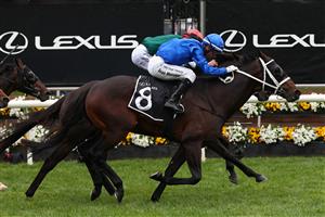 MELBOURNE, AUSTRALIA - NOVEMBER 04: Joao Moreira riding Burma Star to win race eight the Lexus Amanda Elliott during Melbourne Cup Day at Flemington Racecourse on November 04, 2025 in Melbourne, Australia. (Photo by Daniel Pockett/Getty Images)