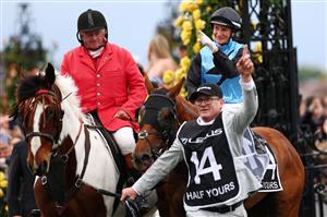 MELBOURNE, AUSTRALIA - NOVEMBER 04: Jamie Melham celebrates after Half Yours won race seven the Lexus Melbourne Cup during Melbourne Cup Day at Flemington Racecourse on November 04, 2025 in Melbourne, Australia. (Photo by Morgan Hancock/Getty Images)